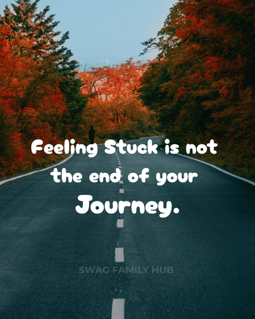 feeling stuck is not the end of your journey motivational quote image with road and autumn trees
