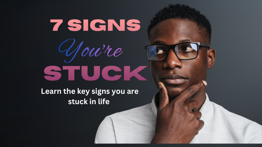 Thoughtful man with hand on chin next to text ‘7 signs you’re stuck in life’”